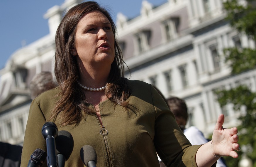 epa07615174 White House Press Secretary Sarah Sanders responds to a question from the news media in the driveway of the West Wing at the White House in Washington, DC, USA, 31 May 2019. Sanders respon ...