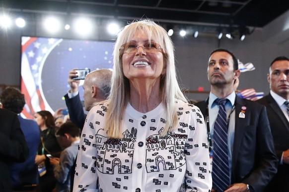 FILE - Miriam Adelson, wife of Las Vegas Sands Corporation Chief Executive and Republican mega donor Sheldon Adelson, listens as President Donald Trump speaks at the Israeli American Council National  ...