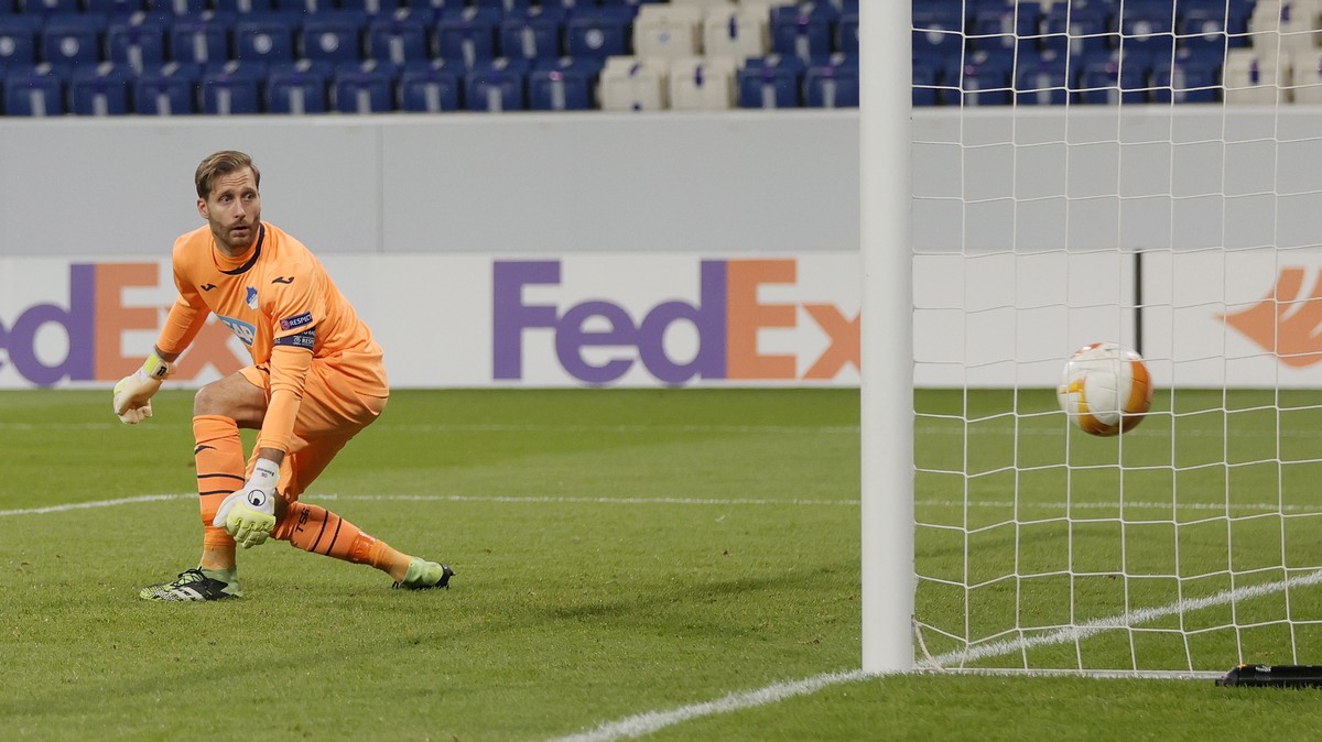 epa09036339 Hoffenheim's goalkeeper Oliver Baumann concedes the 0-1 during the UEFA Europa League round of 32 second leg soccer match between TSG 1899 Hoffenheim and Molde FK in Sinsheim, Germany ...