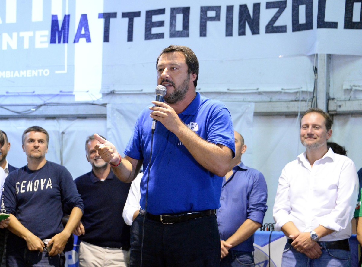 Italian Deputy Premier and Interior Minister, Matteo Salvini, speaks at a Lega party's meeting in Pinzolo, Italy, Saturday, Aug. 25, 2018. Italian state TV says Italy's interior minister is  ...