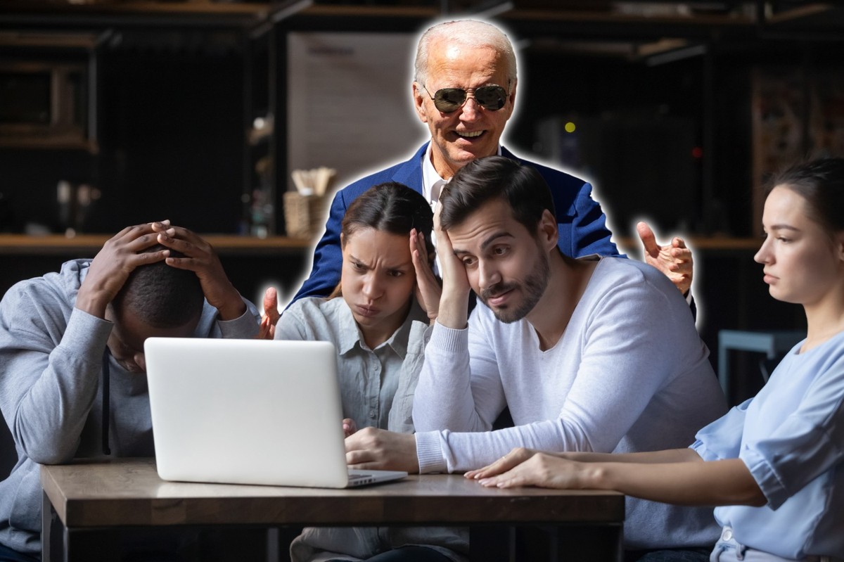 Multiracial friends sitting in cafe bar look at pc screen feels frustrated because of losing online lottery betting loss of money or football fans unsatisfied with referee decision unfair game concept