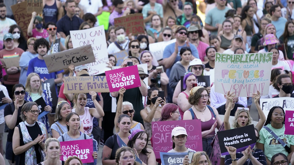 FILE - Abortion rights protesters attend a rally outside the state Capitol in Lansing, Mich., on June 24, 2022, following the United States Supreme Court's decision to overturn Roe v. Wade. Voter ...