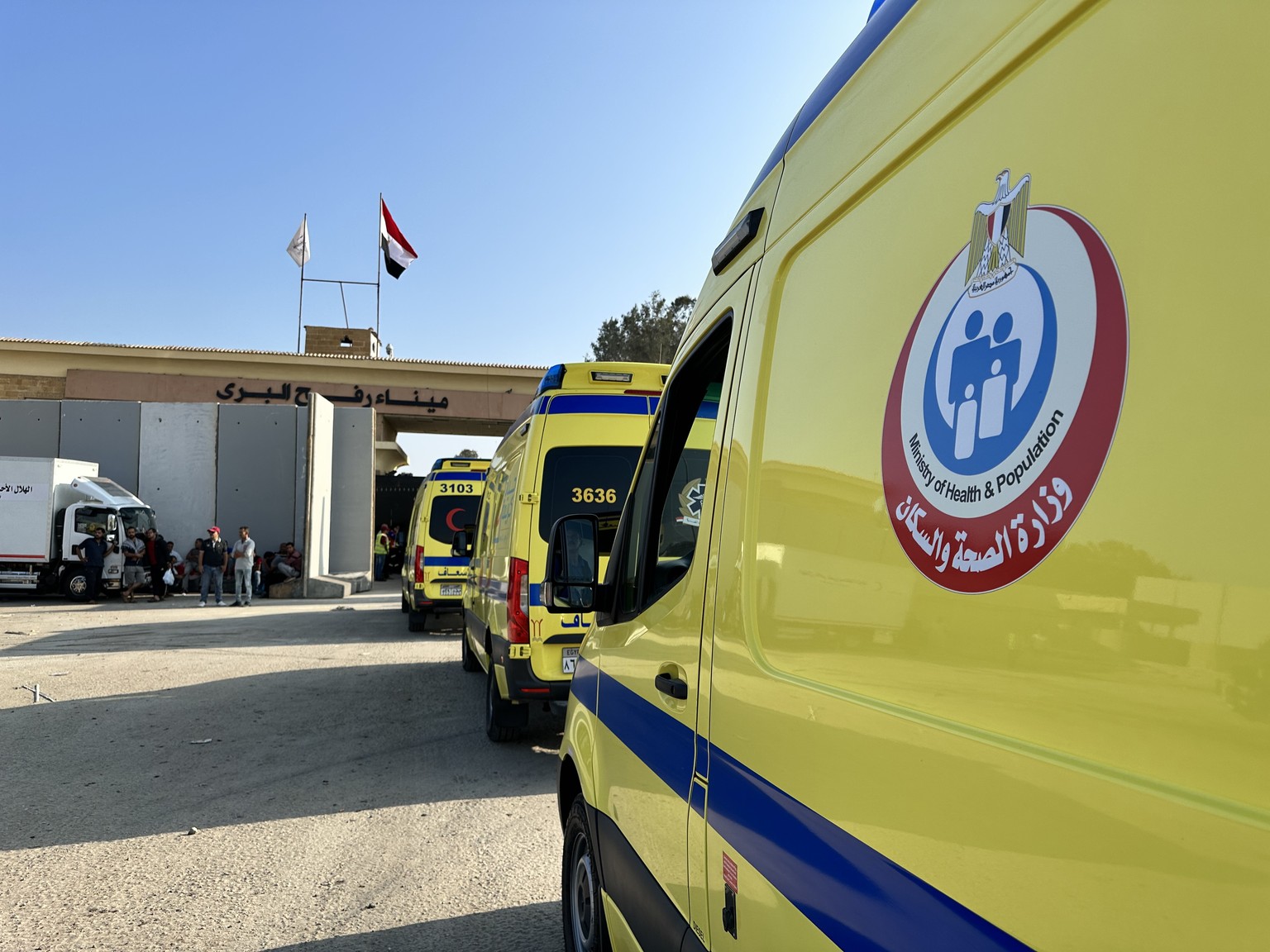 epa10954813 Ambulances cross the Rafah border crossing between the Gaza Strip and Egypt to bring injured people, in Rafah, Egypt, 02 November 2023. As per the agreement made by Egypt, Israel, and Hama ...
