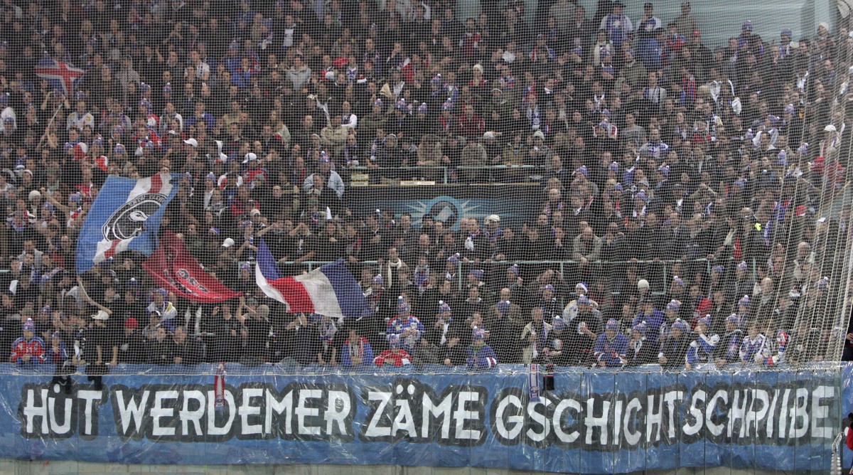 ZSC Lions fans and supportes and a banner saying 'Huet werdemer zaeme gschicht schriibe' (in English: 'Today we will write history together') during the ice hockey Champions League ...