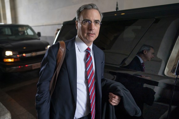 FILE - White House counsel Pat Cipollone departs the U.S. Capitol following defense arguments in the impeachment trial of President Donald Trump on charges of abuse of power and obstruction of Congres ...