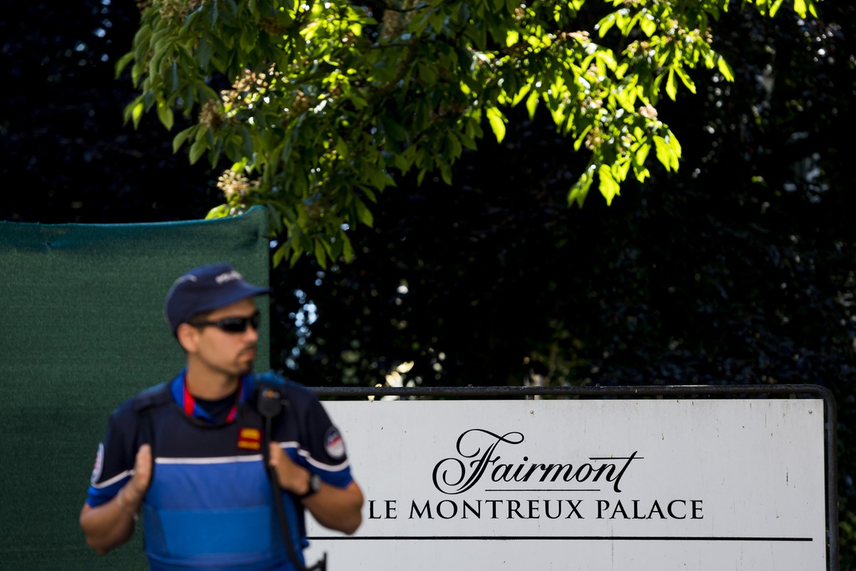 Swiss police guard the entrance of the Fairmont Le Montreux Palace hotel where this year's Bilderberg conference takes place, in Montreux, Switzerland, Saturday, June 1, 2019. The annual informal ...