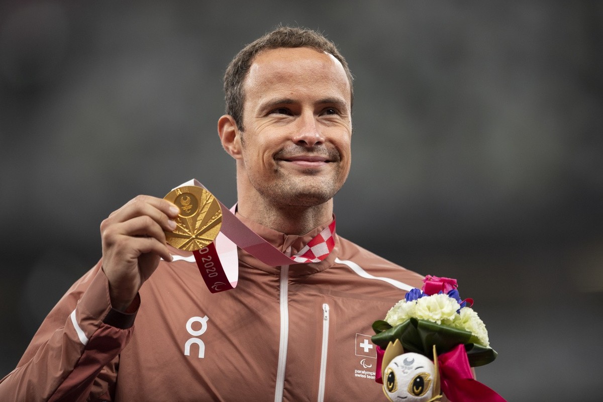 Marcel Hug of Switzerland celebrates his gold medal the Men's 800m T54 Final competition at the 2020 Tokyo Summer Paralympics Games at the Olympic Stadium in Tokyo, Japan, Thursday, September 2,  ...