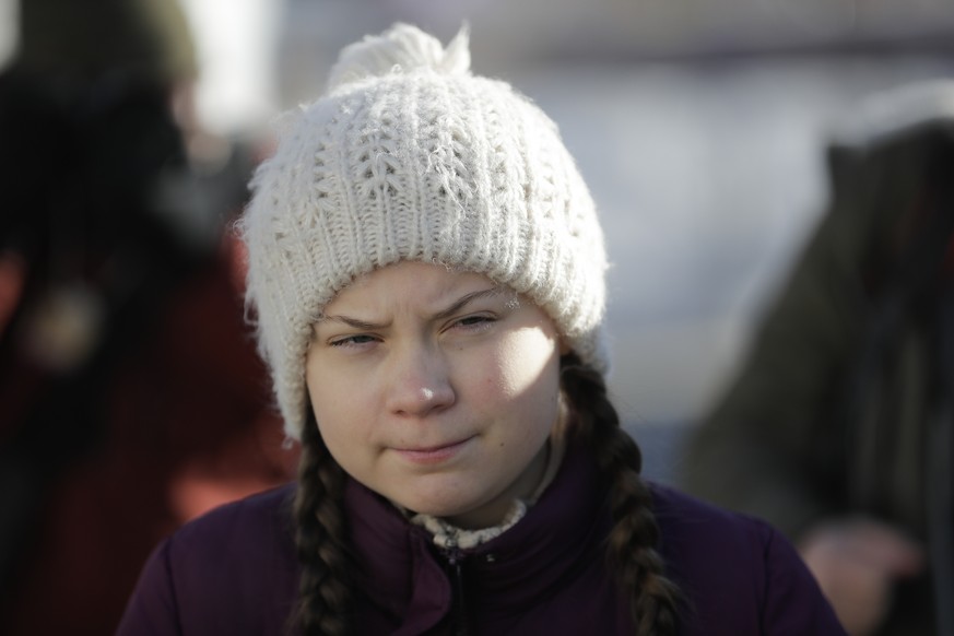 Climate activist Greta Thunberg arrives for a media event near the congress center where the World Economic Forum take place in Davos, Switzerland, Friday, Jan. 25, 2019.(AP Photo/Markus Schreiber)