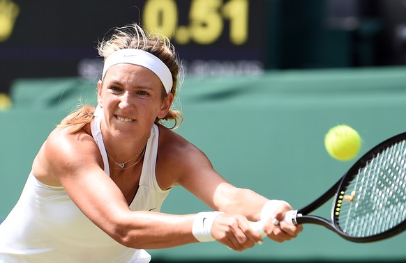 epa06073023 Victoria Azarenka of Belarus returns to Heather Watson of Britain in their third round match during the Wimbledon Championships at the All England Lawn Tennis Club, in London, Britain, 07  ...