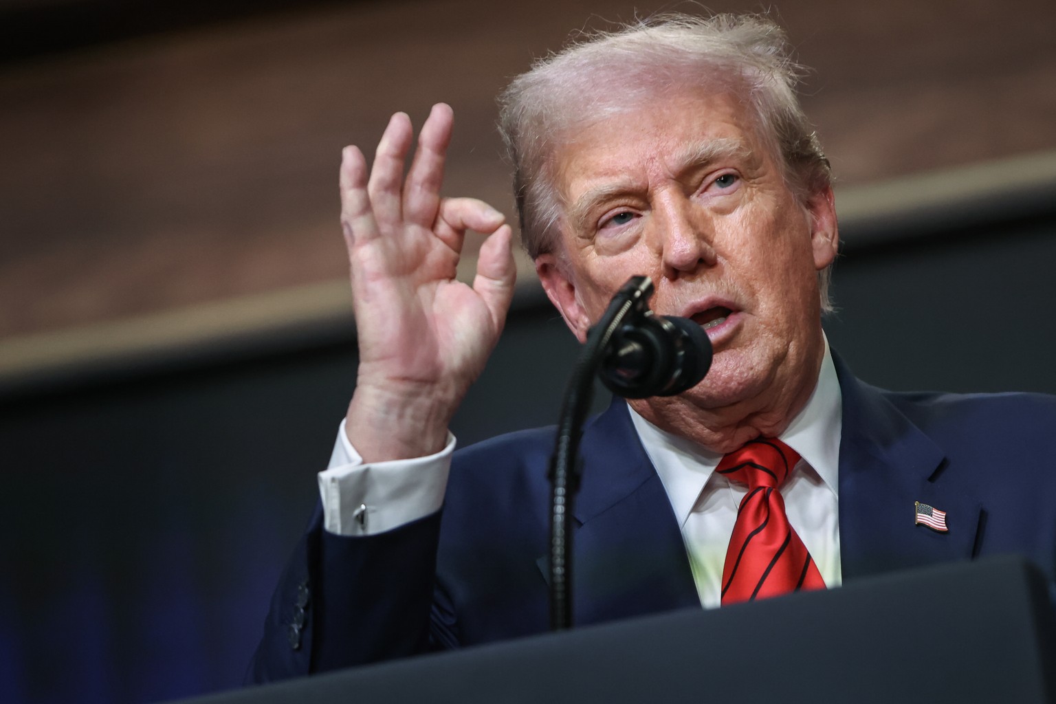epa12285202 U.S. President Donald Trump takes questions after signing an executive order establishing a task force to oversee the Los Angeles 2028 Olympic Games in the South Court Auditorium of the Wh ...