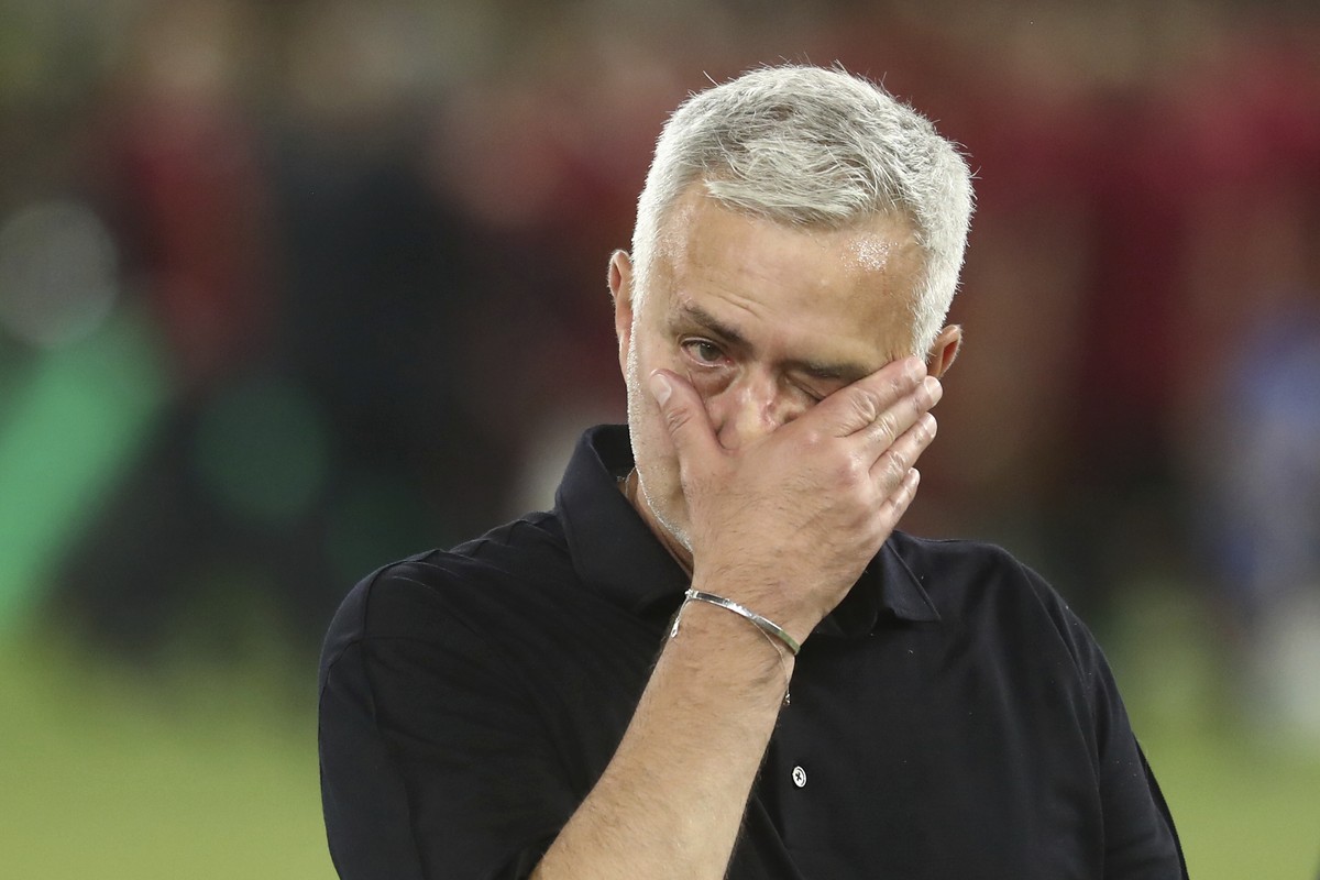 Roma's head coach Jose Mourinho wipes his eyes after winning the Europa Conference League final soccer match between AS Roma and Feyenoord at National Arena in Tirana, Albania, Wednesday, May 25, ...