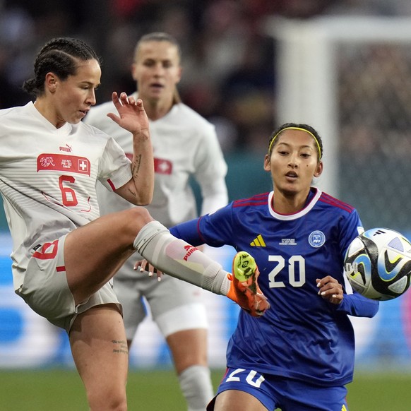 Switzerland&#039;s Geraldine Reuteler, left, reaches for the ball in front of Philippines&#039; Quinley Quezada during the first half of the Women&#039;s World Cup Group A soccer match between the Phi ...