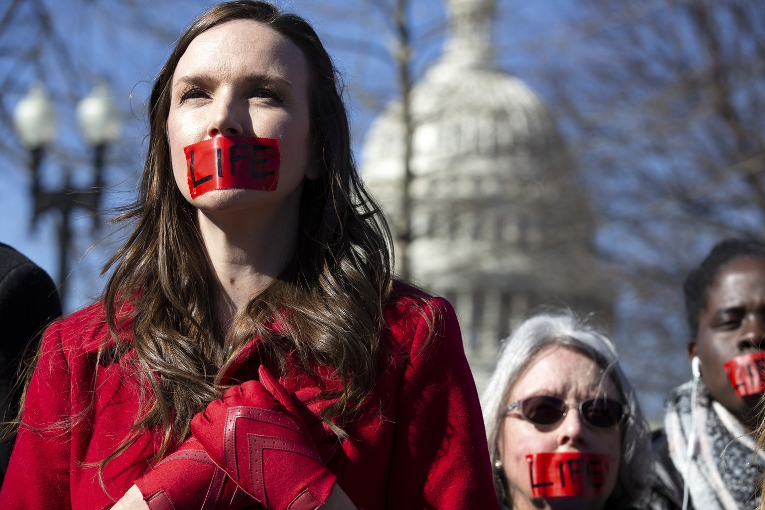 Anti-abortion demonstrators rally outside of the U.S. Supreme Court in Washington, Wednesday, March 4, 2020. The Supreme Court is taking up the first major abortion case of the Trump era Wednesday, an ...