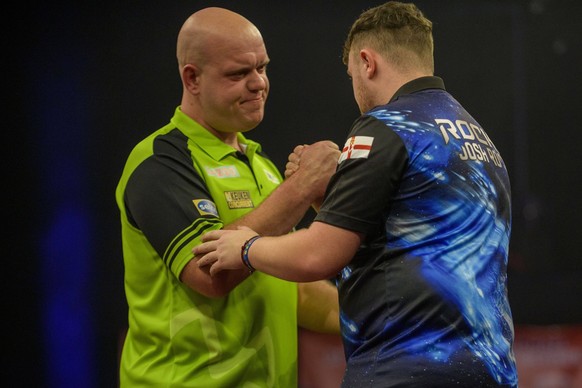 Mandatory Credit: Photo by Stephen Bartholomew/IPS/Shutterstock 13628159an Josh Rock congratulates Michael van Gerwen after their match. Knockout Stage match between Michael van Gerwen v Josh Rock. Th ...