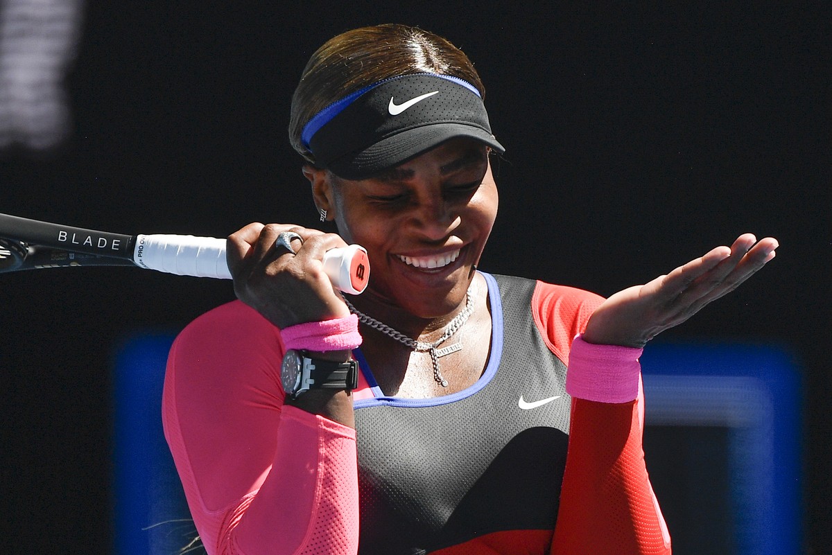 United States' Serena Williams reacts during her semifinal against Japan's Naomi Osaka at the Australian Open tennis championship in Melbourne, Australia, Thursday, Feb. 18, 2021.(AP Photo/A ...