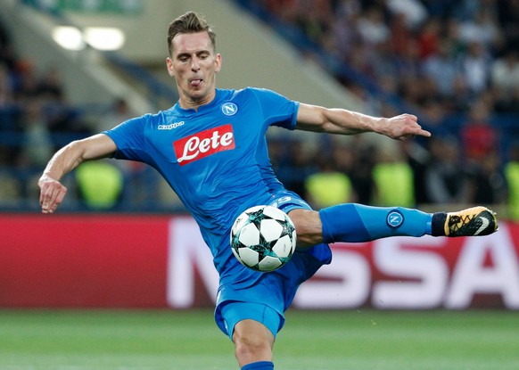 epa06203261 Arkadiusz Milik of Napoli in action during the UEFA Champions League Group F soccer match between Shakhtar Donetsk and SSC Napoli at the Metalist stadium in Kharkiv, Ukraine, 13 September  ...