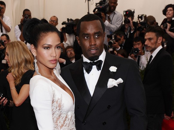FILE - Cassie Ventura, left, and Sean &quot;Diddy&quot; Combs appear at The Metropolitan Museum of Art&#039;s Costume Institute benefit gala celebrating &quot;China: Through the Looking Glass&quot; in ...