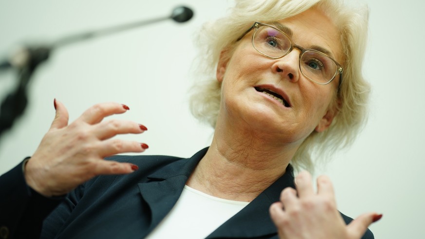 epa10403574 German Defense Minister Christine Lambrecht gestures as she speaks during a joint press statement in Berlin, Germany, 13 January 2023. German Defense Minister Christine Lambrecht gave a jo ...