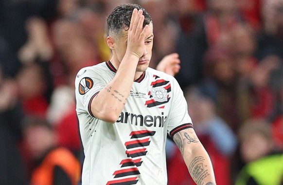 epa11361730 Granit Xhaka of Leverkusen walks after losing the UEFA Europa League Final soccer match of Atalanta BC against Bayer 04 Leverkusen, in Dublin, Ireland, 22 May 2024. EPA/ADAM VAUGHAN