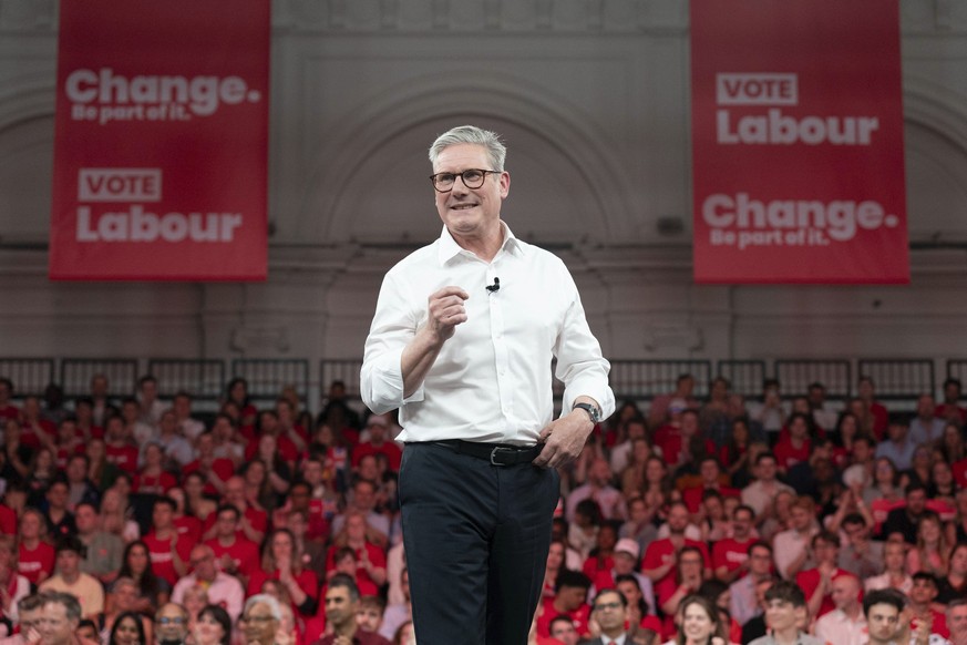 Labour leader Sir Keir Starmer addresses an audience of Labour Party members and supporters during a rally at the Royal Horticultural Halls in central London, during campaigning for the July 4 general ...