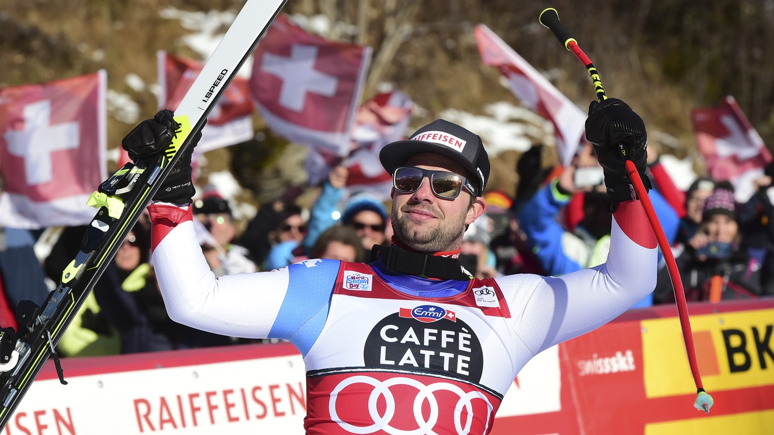 First placed Switzerland's Beat Feuz celebrates at the end of an alpine ski, World Cup men's downhill in Wengen, Switzerland, Saturday, Jan. 18, 2020. (AP Photo/Marco Tacca)