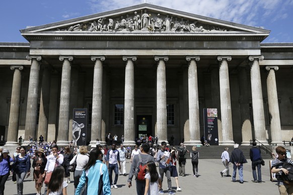 FILE - Visitors walk outside the British Museum in Bloomsbury, London, Friday, June 26, 2015. The British Museum said a member of staff has been dismissed after items were found to be missing, stolen  ...
