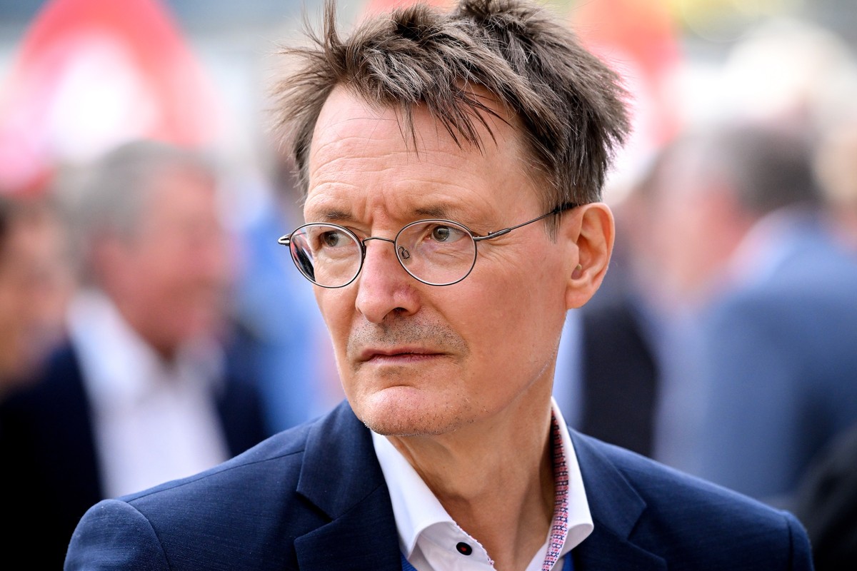 epa09944838 German Minister of Health Karl Lauterbach (SPD) attends a party's election campaign event in Cologne, Germany, 13 May 2022. The 2022 state election for the North Rhine-Westphalian Lan ...