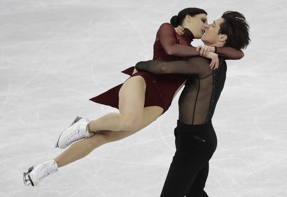 Tessa Virtue and Scott Moir of Canada perform during the ice dance, free dance figure skating final in the Gangneung Ice Arena at the 2018 Winter Olympics in Gangneung, South Korea, Tuesday, Feb. 20, 2018. (AP Photo/Bernat Armangue)