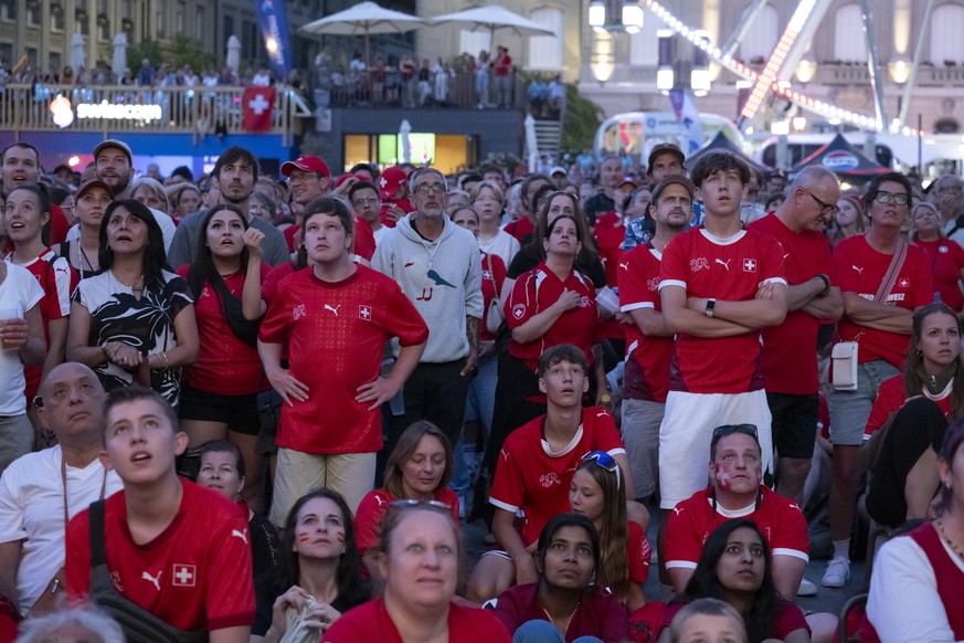 Supporters and Fans from Switzerland reacts at the Fan Zone and public viewing on Bundesplatz Square at the UEFA Women's EURO 2025 quaterfinal soccer match between Switzerland and Spain in Bern,  ...