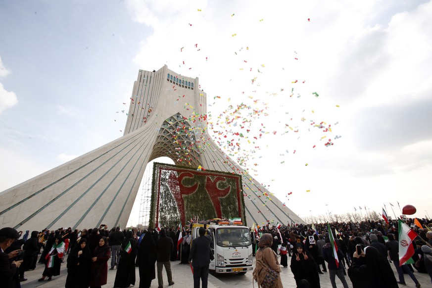 epa10460372 Iranians celebrate the 44th anniversary of the 1979 Islamic Revolution, in Azadi (Freedom) Square in Tehran, Iran, February 11, 2023. The event marks the 44th anniversary of the ...