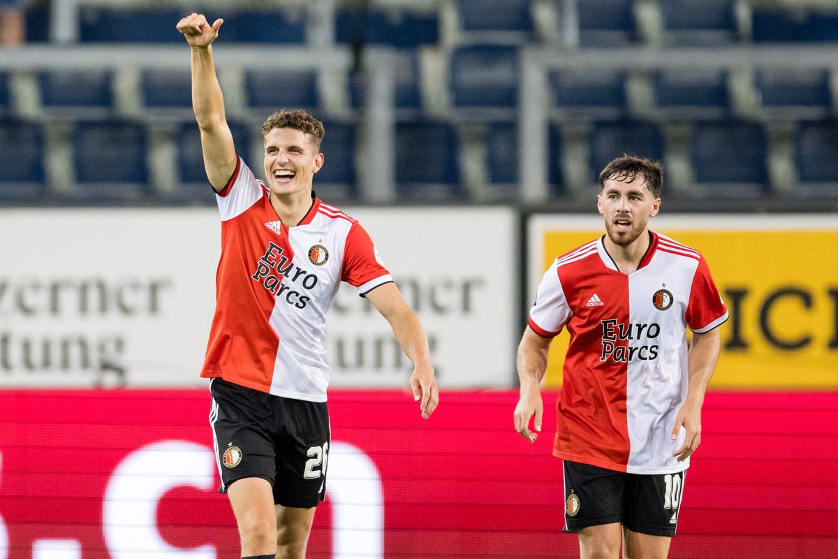 Guus Til (L) of Feyenoord Rotterdam celebrates after scoring his team's 2nd goal next to Orkun Kokcu (R) during the UEFA Europa Conference League third qualifying round 1st leg match between FC L ...