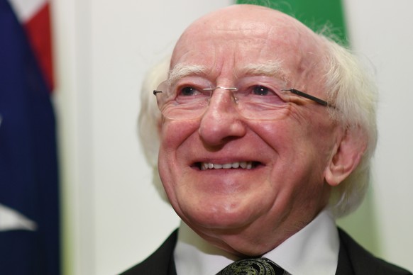 epa07125781 (FILE) - President of Ireland Michael D. Higgins reacts ahead of a meeting with Australian Prime Minister Malcolm Turnbull (not pictured) at Parliament House in Canberra, Australia, 16 Oct ...