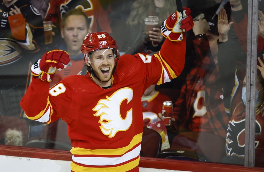 Calgary Flames&#039; Elias Lindholm celebrates his goal during the second period of an NHL hockey game against the Anaheim Ducks Wednesday, Feb. 16, 2022 in Calgary, Alberta. (Jeff McIntosh/The Canadi ...