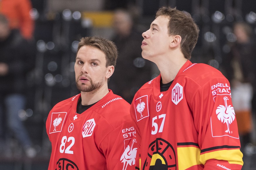 Bern&#039;s Zach Boychuk, left, and Jeremie Kamerzin look on ahead of the Champions Hockey League round of 16 second leg match between SC Bern and Malmoe Redhawks, in Bern, Switzerland, Tuesday, Novem ...