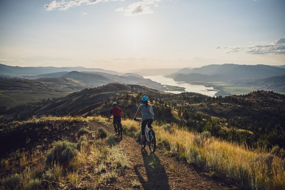 Mountain biking through the arid landscape of Kenna Cartwright Park in Kamloops BC