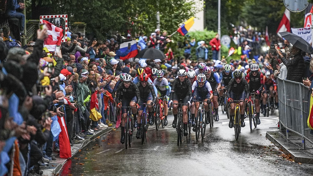 Netherlands' Demi Vollering and Italy's Elisa Longo Borghini lead the peloton during the Women Elite road race of the Cycling and Para-cycling Road World Championships in Zurich, Switzerland ...