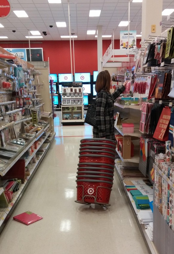 fail Tuesday: Woman in the supermarket takes all the baskets.