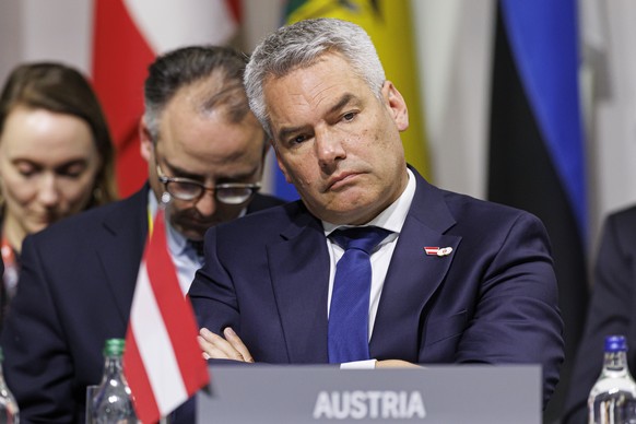 CAPTION CORRECTION: CORRECTS PERSON - Karl Nehammer, Federal Chancellor of Austria attends the plenary session of the Summit on peace in Ukraine, in Stansstad near Lucerne, Switzerland, Saturday, June ...