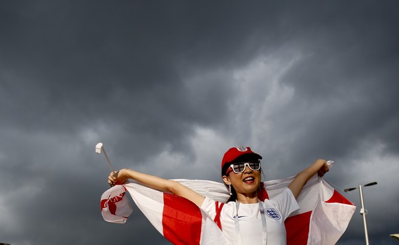 An England fan poses for a picture before the semifinal match between Croatia and England at the 2018 soccer World Cup in the Luzhniki Stadium in Moscow, Russia, Wednesday, July 11, 2018. (AP Photo/Re ...