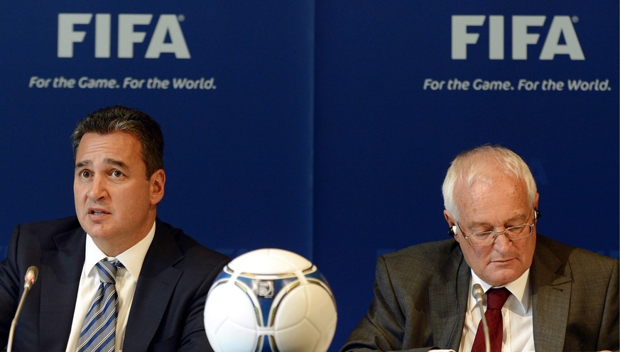 FILE - In this Friday, July 27, 2012 file photo, Chairmen of the two chambers of the new FIFA Ethics Committee Michael Garcia, left, from the US and Joachim Eckert, right, from Germany attend a press  ...