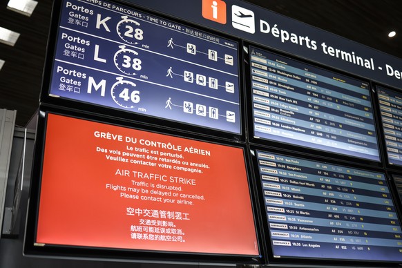 epa12212170 A flight information board inside Roissy-Charles de Gaulle Airport during a French air traffic controllers&#039; strike, in Roissy-en-France outside Paris, France, 03 July 2025. The French ...