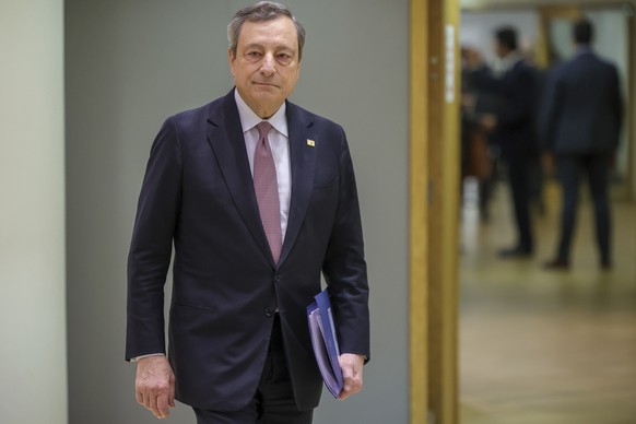 Italian Premier Mario Draghi arrives for the extraordinary meeting of EU leaders to discuss Ukraine, energy and food security in Brussels, Monday, May 30, 2022. European Union leaders will gather Mond ...