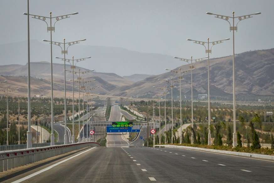 Turkmenistan the best photos from the country where no Swiss have lived since 2016.  Swiss only watson.ch ASHGABAT, TURKMENISTAN - CIRCA SEPTEMBER 2013: New empty highway on the outskirts of Ash...