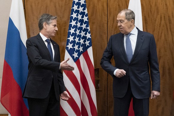 US Secretary of State Antony Blinken, left, greets Russian Foreign Minister Sergey Lavrov before their meeting, in Geneva, Switzerland, Friday, Jan. 21, 2022. (AP Photo/Alex Brandon, Pool)
Antony Blin ...