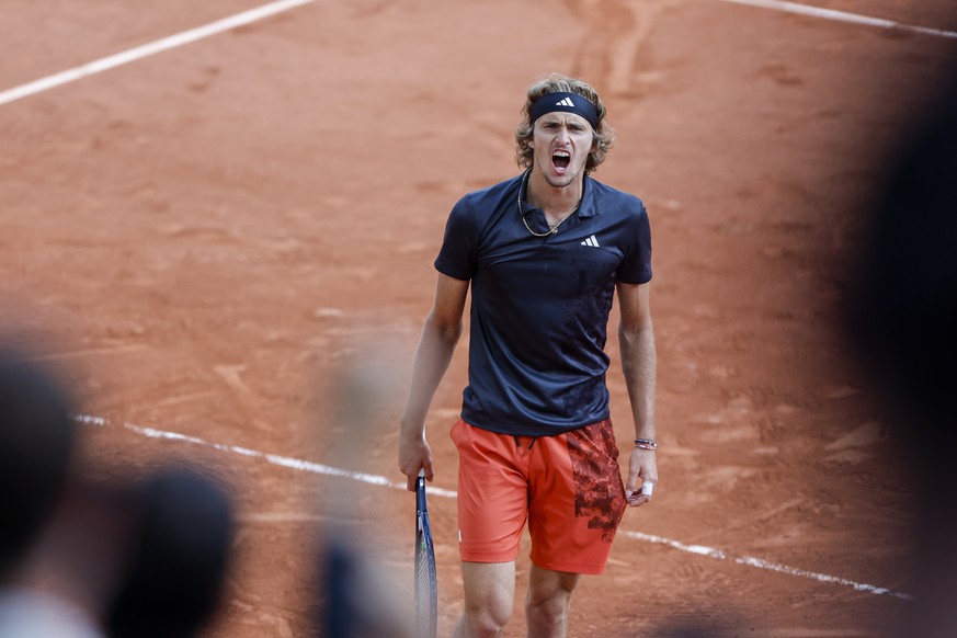 Germany&#039;s Alexander Zverev celebrates winning his quarterfinal match of the French Open tennis tournament against Argentina&#039;s Tomas Martin Etcheverry in four sets, 6-4, 3-6, 6-3, 6-4, at the ...