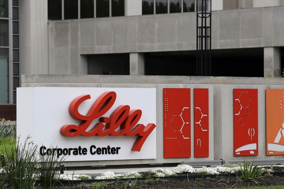 FILE - A sign for Eli Lilly &amp; Co. sits outside their corporate headquarters in Indianapolis on April 26, 2017. The company said Wednesday, May 3, 2023, that its experimental Alzheimer?s drug appea ...