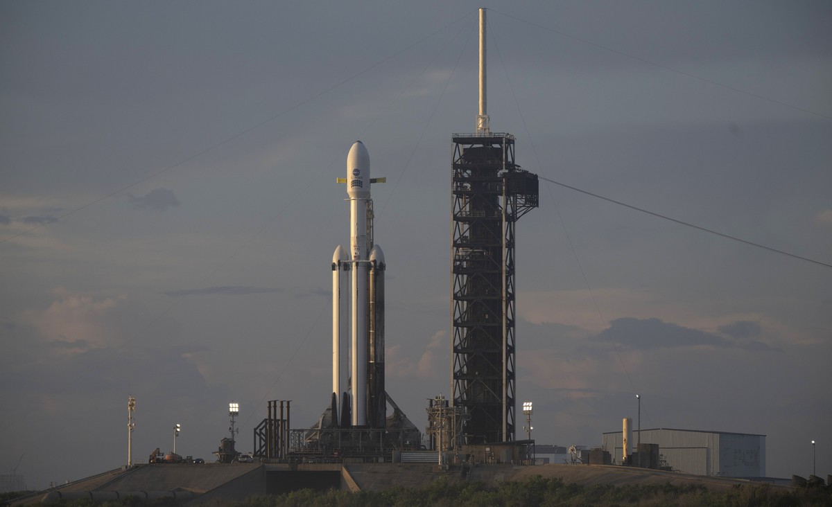 epa13198295 A handout photo made available by NASA shows NASA's Nancy Grace Roman Space Telescope, encapsulated in a protective payload fairing atop a SpaceX Falcon Heavy rocket during sunrise, a ...