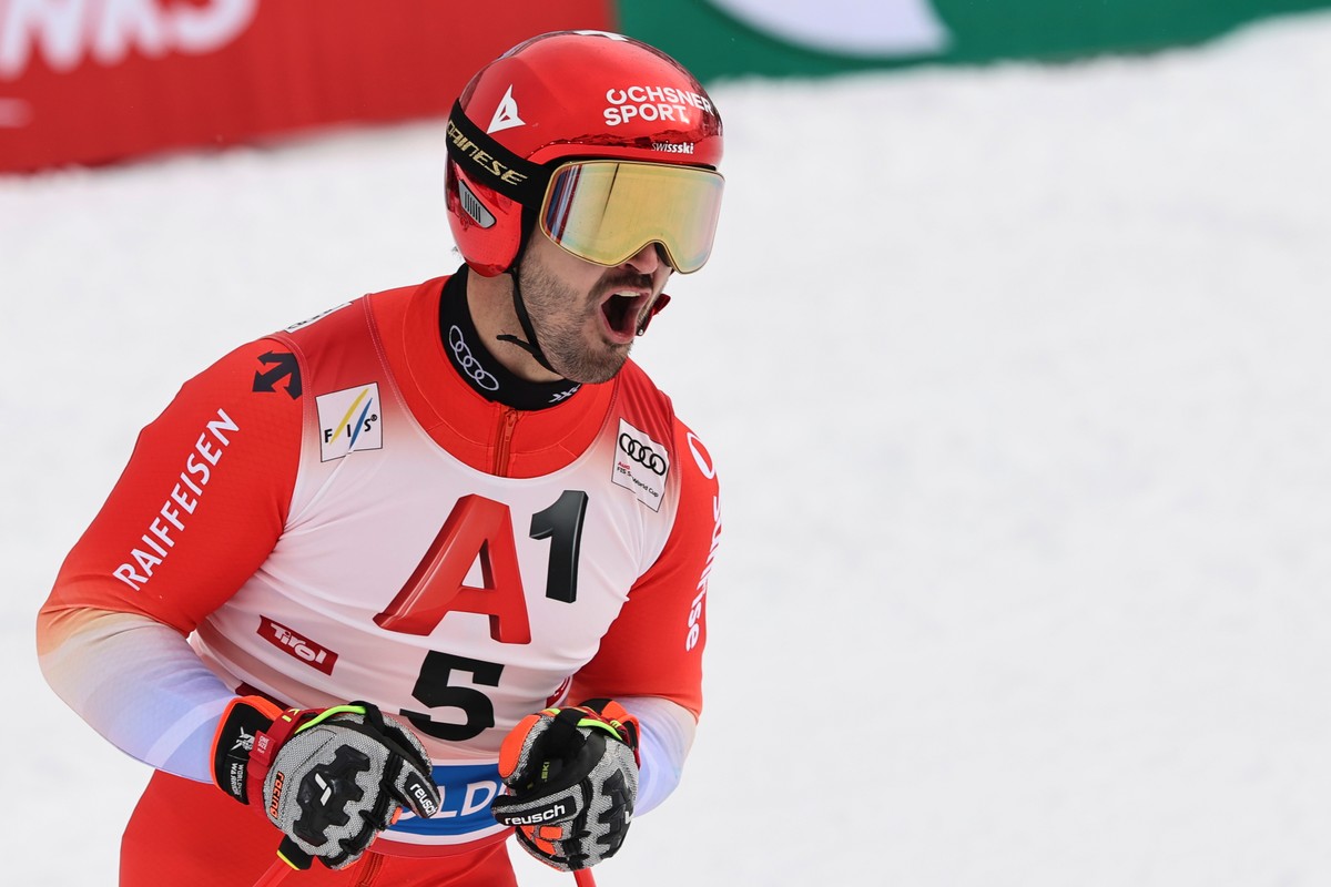 Switzerland's Loic Meillard celebrates taking second place in an alpine ski, men's World Cup giant slalom, in Soelden, Austria, Sunday, Oct. 25, 2026. (AP Photo/Marco Trovati)
Loic Meillard