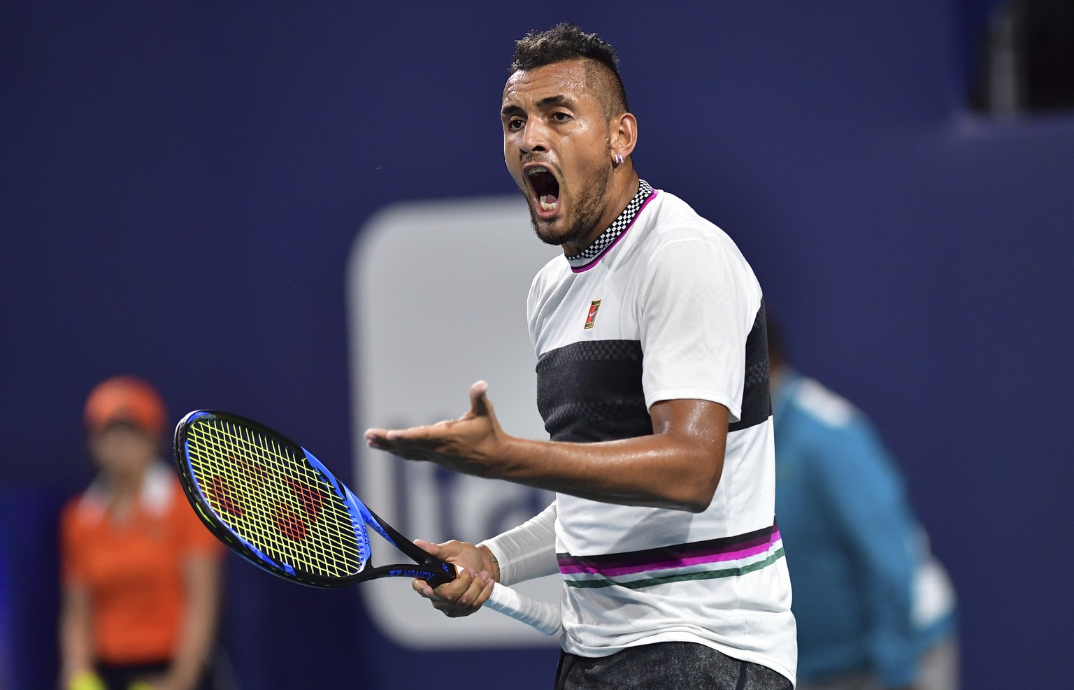 Nick Kyrgios, of Australia, yells during his match against Dusan Lajovic, of Serbia, during the third round of the Miami Open tennis tournament, Sunday, March 24, 2019, in Miami Gardens, Fla. (AP Phot ...