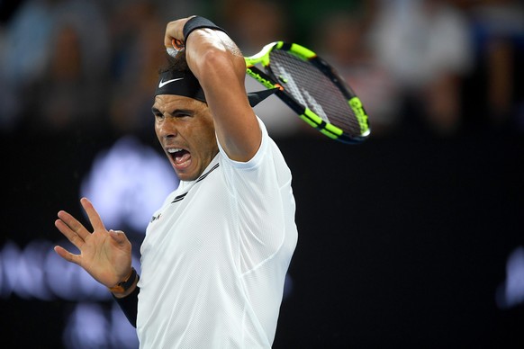 epa05753800 Rafael Nadal of Spain in action during his Men&#039;s Singles semifinal match against Grigor Dimitrov of Bulgaria at the Australian Open Grand Slam tennis tournament in Melbourne, Australi ...